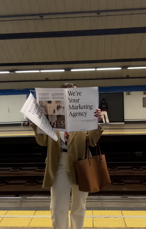 Subway commuter with marketing headline